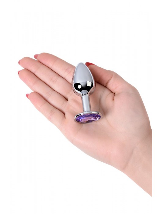 Серебристая конусовидная анальная пробка с фиолетовым кристаллом - 7 см. - ToyFa - купить с доставкой в Великом Новгороде